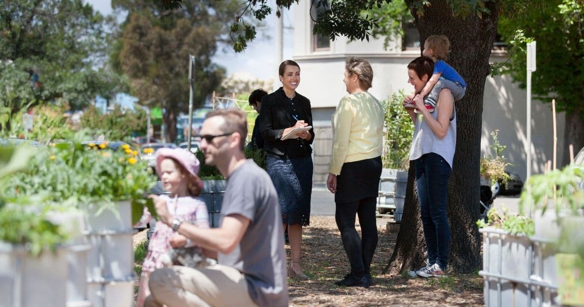 Photo of group of people in a garden setting